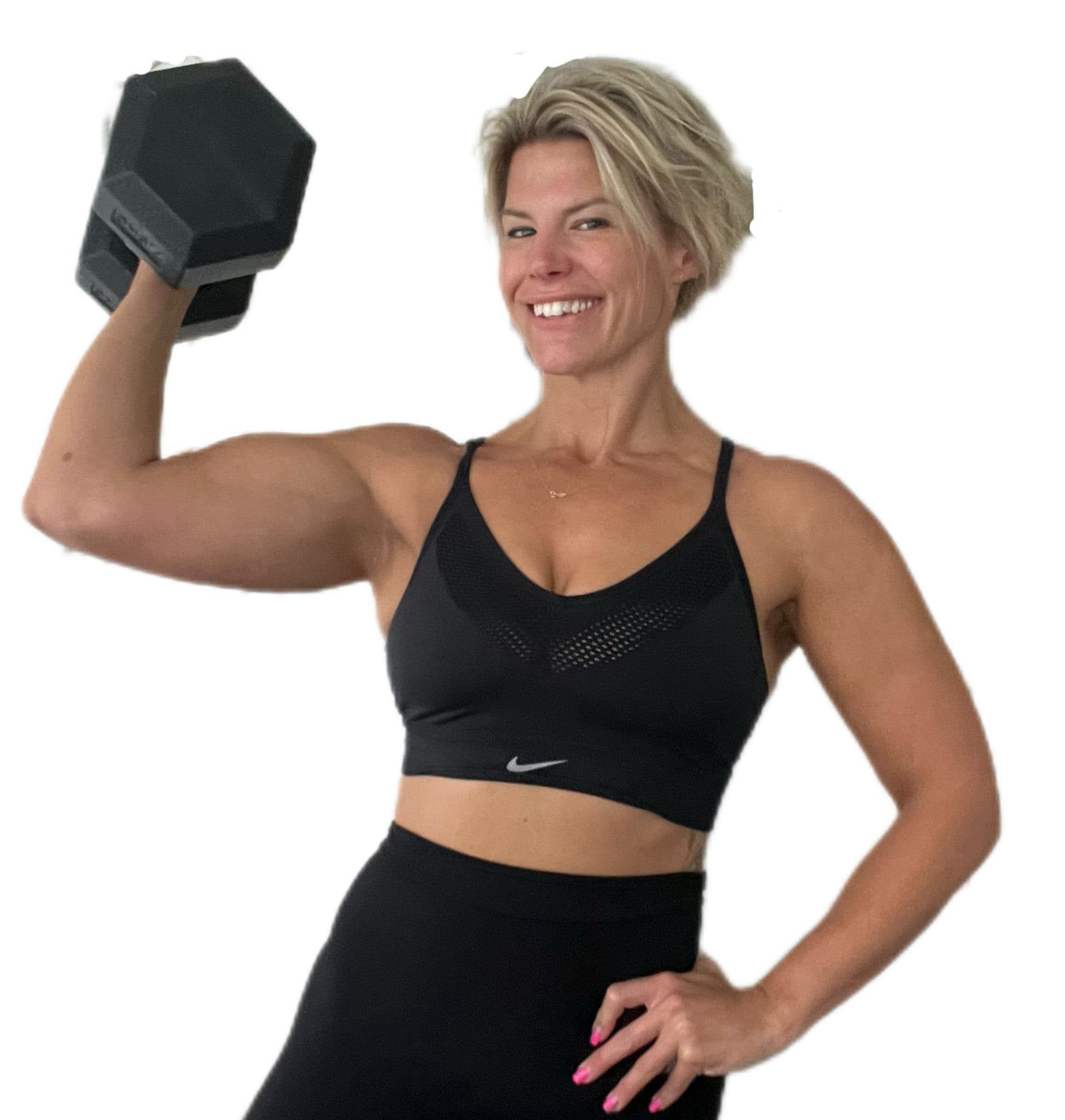 Charli Tucker holding a dumbbell
